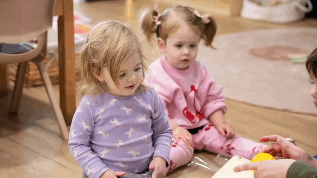 Babies and toddlers engaged in sensory play and creative enrichment activities at Simba Education