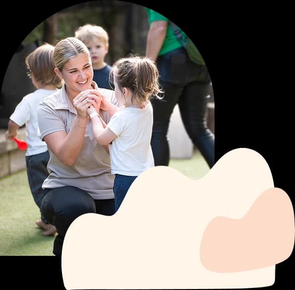 Simba Education educator engaging with two young children