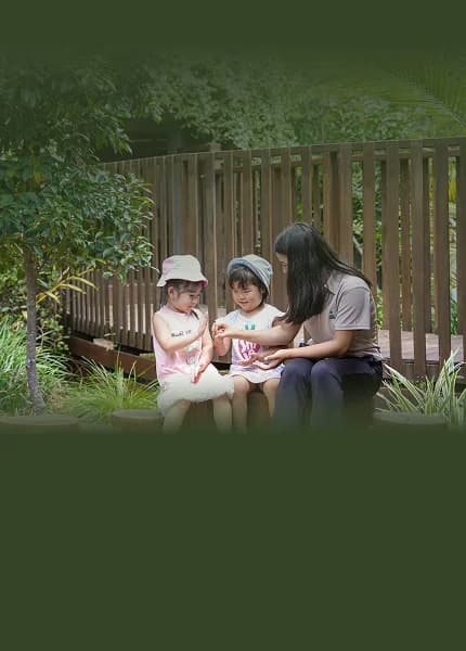 Simba Education educator engaging with children outdoors